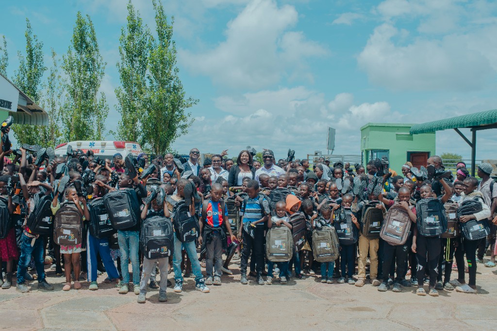 Children receiving school supplies at Oyate Zambia Back to School Drive in Mungule, Zambia
