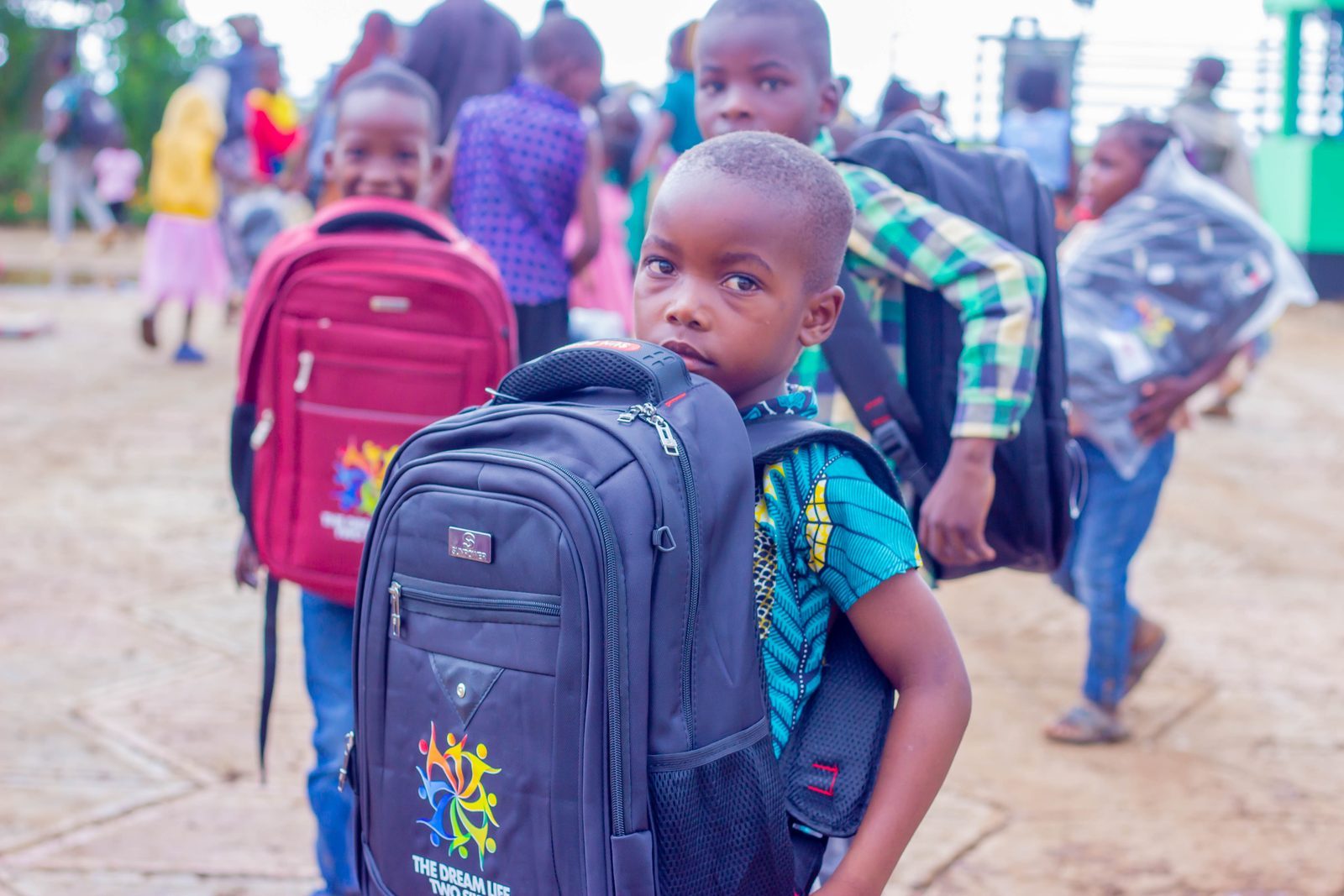 Community gathering for the Back to School Drive