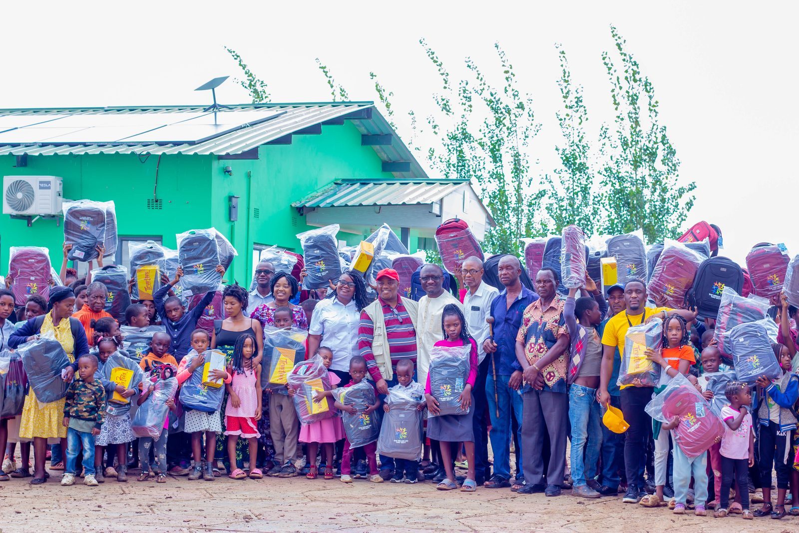 Volunteers and community members outside the health center